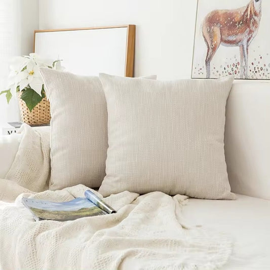 Plain off-white cushion cover with relief.