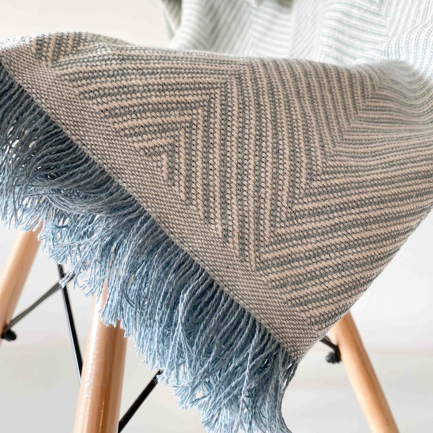 Multipurpose bedspread for sofa or bed with fringes. Beige and Ecru color.