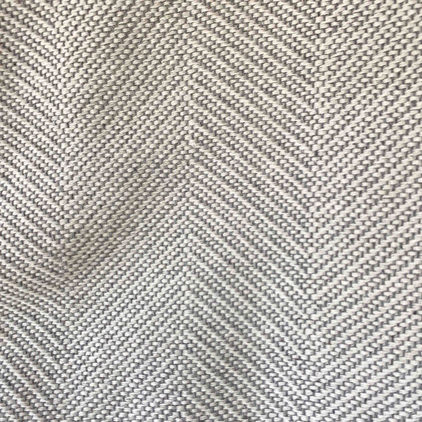 Multipurpose summer quilt for sofa or bed. Light gray color.