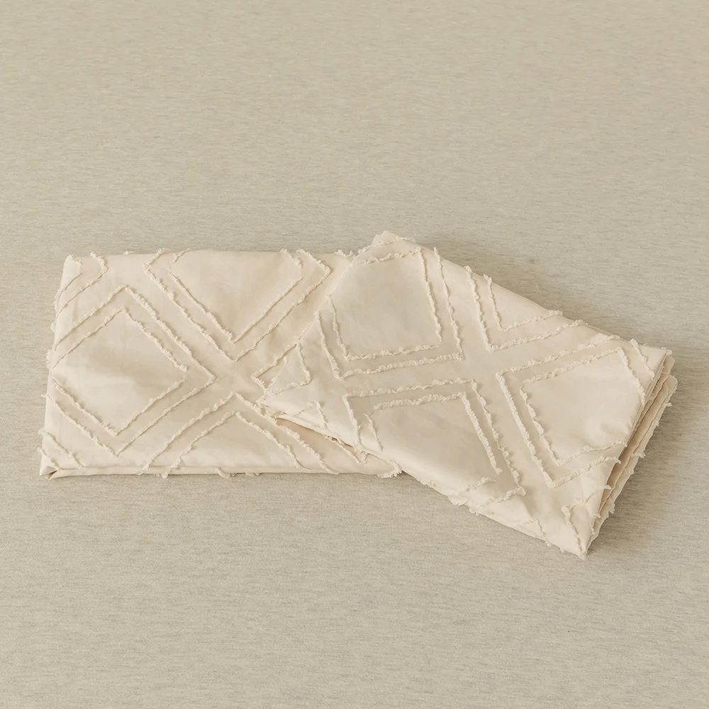 Beige duvet cover with embossed rhombuses, modern and extra soft.