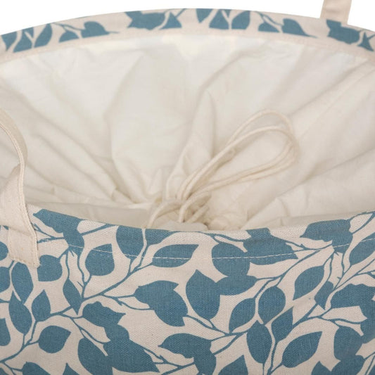 Cesta redonda para ropa de mimbre y tela floral. - Oma Home