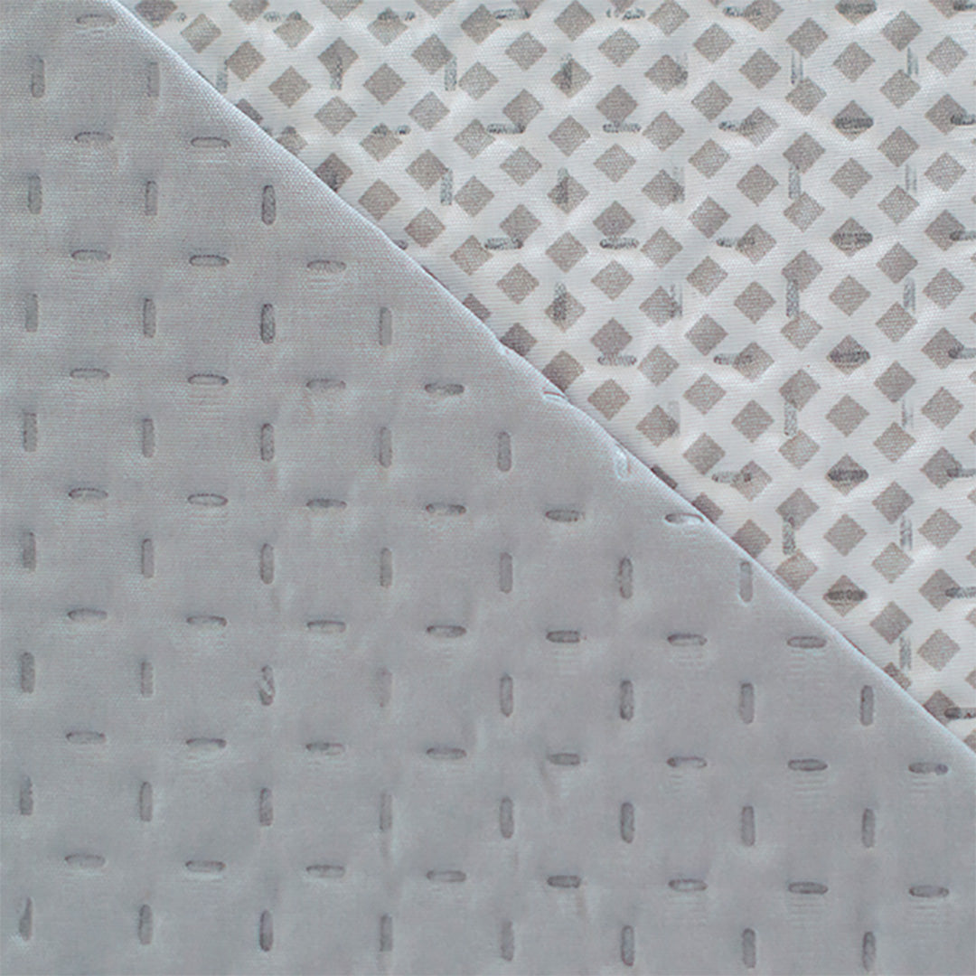 Geometric patchwork quilt with thin padding. Beige.