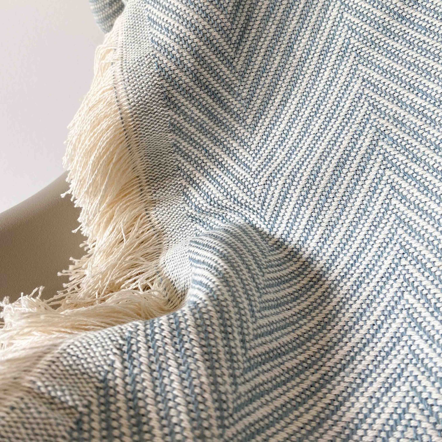 Multipurpose bedspread for sofa or bed with fringes. Beige and Ecru color.