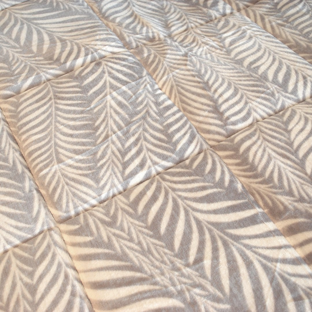 Warm sherpa winter duvet with gray leaf print.