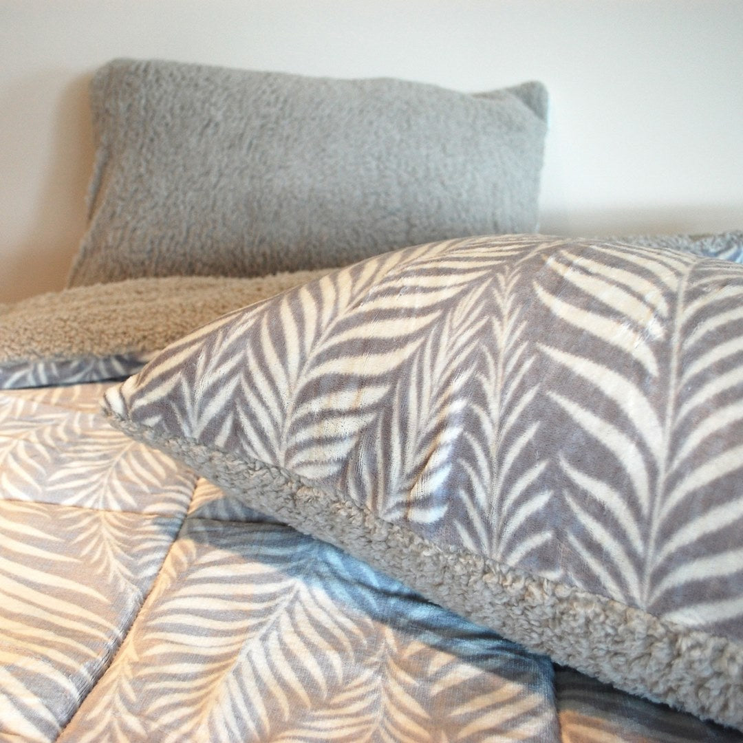 Warm sherpa winter duvet with gray leaf print.