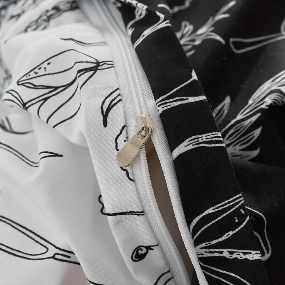 Printed duvet cover with black leaves and pale pink background, extra soft microfiber.