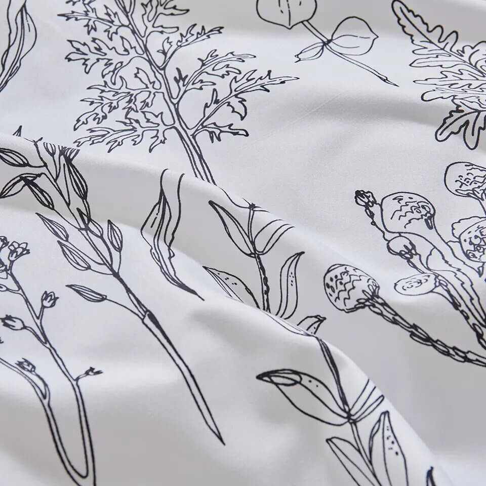 Printed duvet cover with black leaves and pale pink background, extra soft microfiber.