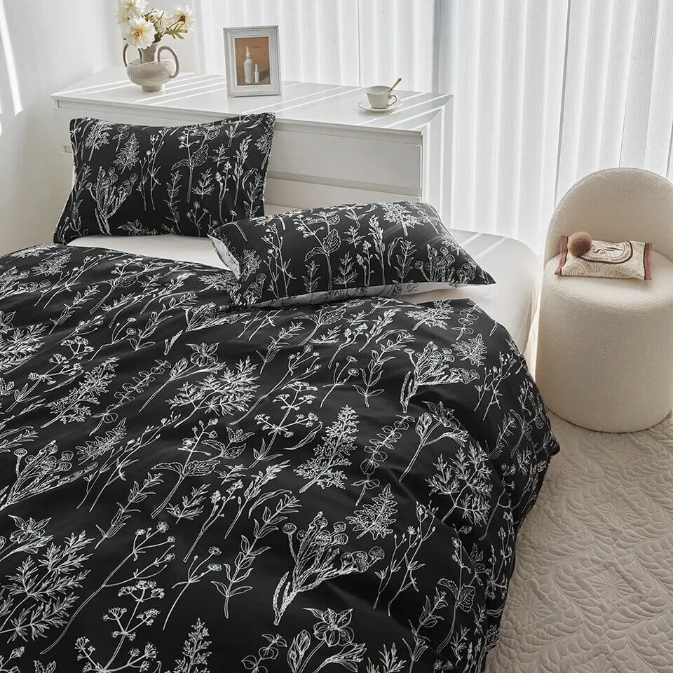 Printed duvet cover with black leaves and pale pink background, extra soft microfiber.