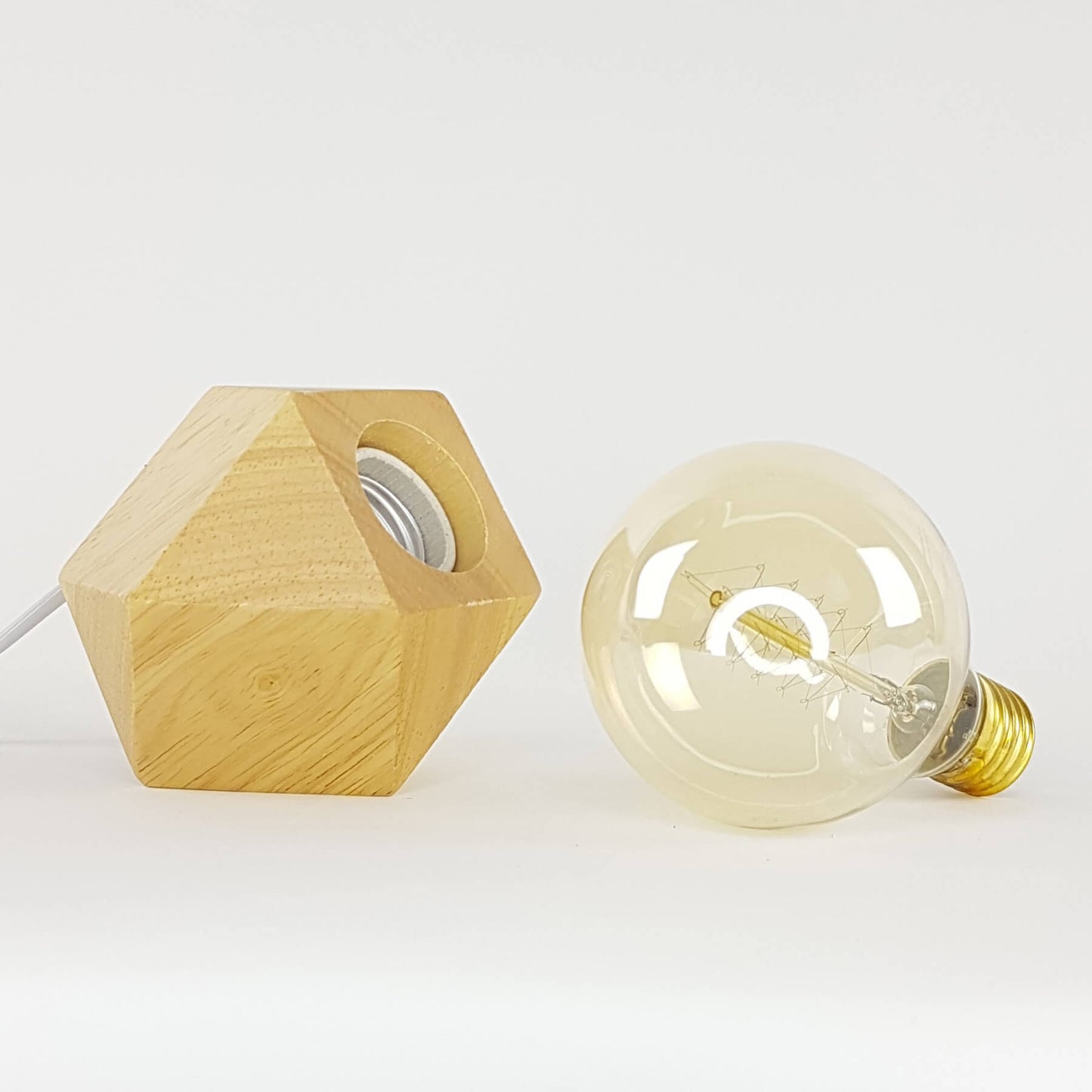 Bedside table lamp with light bulb. Wood with diamond base.