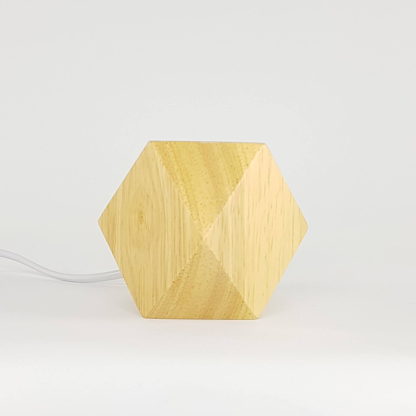Bedside table lamp with light bulb. Wood with diamond base.